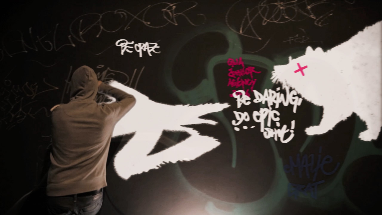 2D Animation von Graffiti auf Wand hinter Schauspieler projiziert